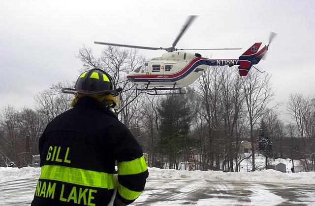 Stat Flight transporting patient after a serious motor vehicle accident Pictures Copyright © Frank Becerra Jr.